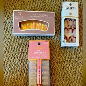 3 boxes of press on nails.